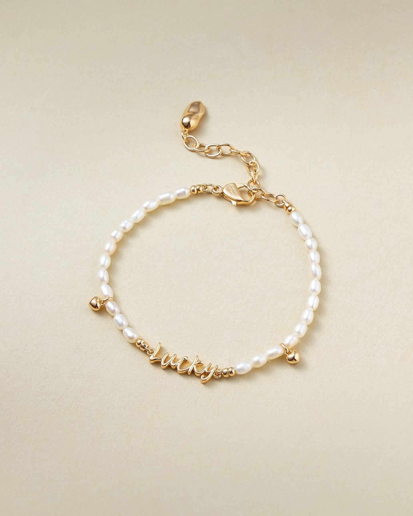 Good Luck Letter Pearl Bracelet - Amber lollipop